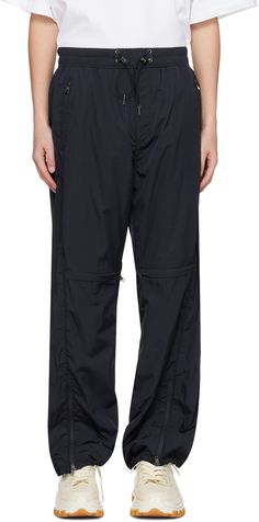 Nylon taffeta track pants. · Paneled construction · Bungee-style drawstring at elasticized waistband · Three-pocket styling · Zip-fly · Zip vent at knees and cuffs · Bungee-style drawstring at cuffs · Full mesh lining Supplier color: Navy Nylon Pants, Man Weave, Pull On Pants, Fashion Pants, Track Pants, Mens Pants, Apparel Accessories, Track, Mesh