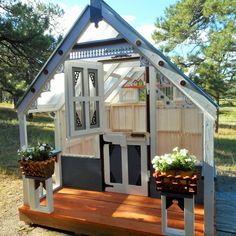 a small house made out of wood and plastic