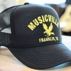 Musicville Eagle Hat

Otto Cap 5 Panel High Crown Mesh
Back Trucker Hat
Color: Black + Yellow
Fit: One Size Fits Most
May 2024 Update: same desi... Vintage Black Trucker Hat For Summer, Black Hip Hop Trucker Hat With Short Brim, Urban Black Trucker Hat For Summer, Black Urban Trucker Hat For Summer, Adjustable Hip Hop Hat For Music Festival, Casual Black Hat For Music Festival, Vintage Black Snapback Hat With Short Brim, Black Vintage Snapback Hat With Short Brim, Black Hats For Summer Music Festival