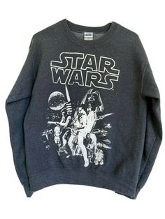 a star wars sweatshirt with an image of darth vader and chew - o's on it