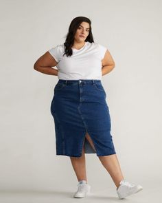 This is the denim skirt of your dreams. It's part bohemian, part western, and part fashionably modern. The perfect pencil silhouette is made from our soft denim fabric with invisible stretch and boasts a brand-new wash. With a mid-rise fit, it features a subtle deconstructed look with patchwork seaming and a raw hem. We paid particular attention to the trims and finishes—the raw hem looks clean and intentional, and the custom topstitching was chosen just for this skirt. Jean Skirt Outfits Plus Size, Puffer Vest Fashion, Jean Skirt Outfits, Athleisure Pants, Pencil Silhouette, Denim Skirt Outfits, Weekend Dresses, Stylish Work Attire, Langer Rock