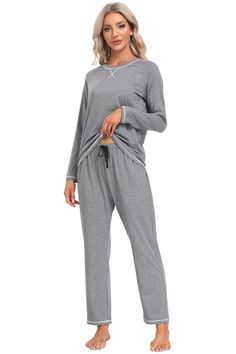 Material: 91% Polyester, 9% Spandex Material characteristics： 91% Polyester, 9% Spandex. Womens pajama set were made of lightweight, stretchy, soft and skin-friendly fabric, keep you relaxed while sleeping at night and enjoy superior comfort. Features: The long sleeve pajama tops with round neck & front fashion design, simple but elegant, perfect for house or daily wear on cooling day. Full length pajama pant with elastic waistband, features loose fit to offers you tummy support, allowing more freedom to move or rollover in the bed and making you as comfortable as possible.2 side pockets can Can store mobile phone. Occasion: The sleepwear is perfect as a Christmas, Valentine's Day, Mother's Day, New Year's Day, anniversary and birthday gift for your mom, wife, daughter, girlfriend or frien Comfy Sleepwear With Pockets For Loungewear, Sleepwear With Pockets For Loungewear, Cozy Sleepwear With Pockets For Loungewear, Cozy Loungewear Sleepwear With Pockets, Loungewear Sets With Pockets, Comfortable Solid Color Sleepwear With Pockets, Gray Cotton Sleepwear For Loungewear, Comfortable Solid Sleepwear With Pockets, Comfy Stretch Solid Color Sleepwear