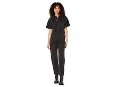 Free People Marci Jumpsuit - Women's Jumpsuit & Rompers One Piece : Iron Black : Exude a bold persona by wearing the classy Free People Marci Jumpsuit. Relaxed silhouette. Soft, semi-stretchable denim fabric. Pull-on style. Versatile coverall with classic spread collar and short sleeves. Defined elasticized waistband to enhance the shape. Center-front button closure. Two patch pockets on the front. 100% cotton. Machine washable. Imported. Measurements: Chest: 21 in. Waist: 15 in. Inseam: 28½ in. Short Sleeve Denim Jumpsuit With Pockets, Short Sleeve Denim Jumpsuit For Work, Cotton Denim Jumpsuit With Short Sleeves, Fitted Denim Jumpsuit With Pockets And Short Sleeves, Casual Jumpsuits And Rompers With Short Sleeve, Relaxed Fit, Casual Short Sleeve Jumpsuits And Rompers With Relaxed Fit, Casual Short Sleeve Relaxed Fit Jumpsuits And Rompers, Fitted Jumpsuits And Rompers With Pockets And Short Sleeves, Collared Denim Jumpsuit With Pockets