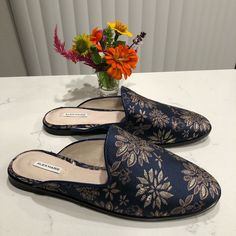 Brand New Never Used Alex Marie Cadina Floral Slip On Mules Brocade Fabric Upper Leather Lined Cork Insert Sole Size 8 Color Blue And Tan Embroidered Floral Print Blue Formal Slip-ons For Spring, Formal Summer Flat Slip-ons, Formal Flat Slip-ons For Summer, Formal Blue Slip-ons For Spring, Formal Summer Slip-on Slippers, Formal Flat Summer Slippers, Blue Slip-on Loafers For Fall, Formal Closed Toe Slippers, Formal Closed-toe Slippers For Spring