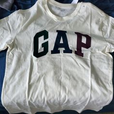 Brand New With Tags Gap Vintage Shirt Gap T-shirt With Letter Print For Streetwear, Gap Graphic Print T-shirt For Streetwear, Sporty Cotton Tops By Gap, Gap Graphic Print Crew Neck T-shirt, Gap Cotton Tops With Logo Print, Gap Cotton T-shirt With Letter Print, Sporty Crew Neck Tops From Gap, Sporty Crew Neck Tops By Gap, Gap White Graphic Print Top