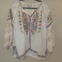 Johnny Was Blouse Sz Medium, White, Good Condition, Purchased About A Year Ago On Poshmark But Never Worn, Linen, Peasant Blouse Style, Embroidered, Absolutely Beautiful, 3/4 Sleeve. Casual White Blouse With Floral Embroidery, Spring Peasant V-neck Top, Spring Peasant Style V-neck Top, Casual White Embroidered Peasant Top, Beach White Cotton Peasant Top, White Cotton Peasant Top For Beach, White Peasant Top For Daywear, White Long Sleeve Bohemian Top, Bohemian White V-neck Blouse