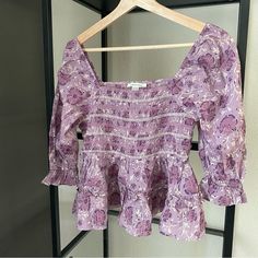 Nwt American Eagle Floral Smocked Top Color: Purple Multi Size: Xsmall Smocked With Flowy Bottom Can Be Worn On Or Off Shoulder Ptp Approx 13.5” Shoulder To Hem Where It’s Hanging Approx 19” Fitted Bohemian Smocked Top, Spring Peasant Smocked Top, Fitted Peasant Smocked Top With Puff Sleeves, Bohemian Cotton Smocked Top, Fitted Bohemian Smocked Top For Brunch, Summer Purple Smocked Top With Smocked Bodice, Purple Smocked Top With Smocked Bodice For Summer, Spring Purple Smocked Top, Peasant Smocked Top With Puff Sleeves