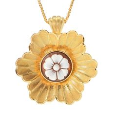 Make an elegant, eye-catching statement on your neckline with this Cameo Italiano flower pendant with chain. It features a beautiful 18mm shell cameo at the center of the flower. It's expertly crafted in 18K yellow gold plated sterling silver with a polished finish. The 17.5" rope chain has a 1.75" extender to perfectly complement your wardrobe. Pair with matching earrings 206-485 to create a stunning coordinated style. Elegant Round Pendant Intaglio Necklace, Elegant Flower-shaped Large Pendant Jewelry, Elegant Flower Shaped Large Pendant Jewelry, Elegant Floral Large Pendant Jewelry, Elegant Cameo Medallion Necklace, Elegant Medallion Necklace With Flower Charm, Elegant Medallion Necklace With Carved Detail, Elegant Medallion Necklace With Intaglio, Elegant Medallion Necklaces With Intaglio