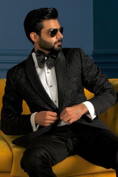 Black tuxedo embellished with bead wavy patterns and welt pockets. Comes with pleated shirt, trouser and bowtie. - Aza Fashions Black Blazer For Party And Gala, Black Blazer For Gala Parties, Elegant Suits For Gala Party, Formal Fitted Dressy Blazer, Dressy Fitted Blazer For Formal Occasions, Luxury Embellished Party Suit, Elegant Embellished Party Suits, Fitted Dressy Blazer For Formal Occasions, Elegant Gala Party Suits