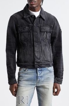 Designer Mike Amiri puts a distinct twist on an Americana icon with a hand-distressed denim jacket featuring slanted seams forming a statement-scale monogram. 28 1/2" length (size medium) Hidden front-snap closure Spread collar Snap cuffs Chest flap-patch pockets; front welt pockets Adjustable snap side tabs 100% cotton Dry clean Made in the USA Designer Clothing Designer Long Sleeve Denim Jacket For Streetwear, Black Distressed Fitted Denim Jacket, Fitted Selvedge Denim Jacket For Streetwear, Edgy Washed Black Distressed Denim Jacket, Urban Fitted Washed Denim Jacket, Fitted Washed Denim Jacket In Urban Style, Winter Streetwear Denim Jacket With Selvedge, Fitted Washed Denim Jacket For Streetwear, Fitted Distressed Acid Wash Outerwear