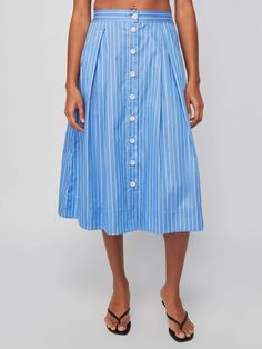 A classic button down, pleated midi skirt with a defined waist and the ultimate feminine vibes. Pairs well with a white tee and whatever your weekend plans are… (This one comes in Day Trader.) | Women's Idra Skirt in Day Trader | Ethical Essentials Feminine Vibes, Georgette Skirt, Smocked Skirt, Defined Waist, Pleat Skirt, Tie Front Cardigan, Satin Midi Skirt, Day Trader, Weekend Plans