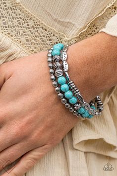 An earthy collision of turquoise stones, ornate silver beads, and hammered silver accents are threaded along with stretchy bands, creating colorful layers that stack up the wrist. Sold as one set of three bracelets. Santa Fe Jewelry, Paparazzi Fashion, Paparazzi Accessories, Trendy Collection, Turquoise Stones, Trail Mix, Stretchy Bracelets, Layered Bracelets, Paparazzi Jewelry