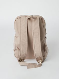 Need a backpack that's both sustainable and practical for college, school everyday use or outdoor activities? Our Earth Backpack is perfect for you. Our spacious and durable Earth Backpack is the workhorse of our line, built for everyday carry with heavy-duty certified organic cotton canvas. The generous main compartment is divided with a no-fuss sleeve for your laptop and one small interior pocket to keep things organized. Two water bottle sleeves and the large zippered exterior pocket keep hyd Versatile Laptop Bag For Everyday And Back To School, School Leather Backpack With Adjustable Straps, Versatile Back-to-school Laptop Bag, Casual Beige Leather Student Backpack, Everyday Standard Backpack, Versatile Softback Backpack For Back To School, Everyday Leather Softback Backpack For Back To School, Everyday Softback Leather Backpack For Back To School, Beige Backpack Laptop Bag For Daily Use