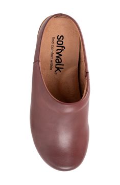 A plain toe and smooth leather upper create a polished silhouette on a versatile mule grounded by a well-cushioned footbed for lasting comfort. 1 1/4" heel Removable, cushioned insole with arch support Leather upper/synthetic lining/rubber sole Imported Cushioned Flat Heel Clogs For Work, Flat Heel Clogs With Cushioned Footbed For Work, Comfortable Mules For Work With Leather Footbed, Classic Synthetic Clogs With Leather Sole, Classic Closed Toe Mules With Cushioned Footbed, Closed Toe Clogs With Cushioned Footbed, Solid Color Closed Toe Clogs With Cushioned Footbed, Classic Clogs With Cushioned Footbed And Plain Toe, Leather Mules With Cushioned Footbed, Medium Width