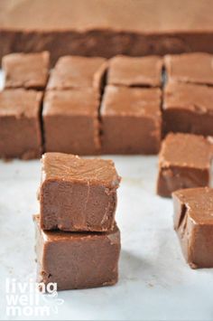 several pieces of brownie sitting on top of a table