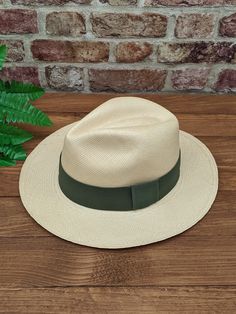 Handmade Panama Hat and Removeable ~ Olive Green ~ Accessory Band The band is interchangeable and can be removed to reveal a plain dark band underneath (dark band fixed to hat). The removeable band is elasticated and will stretch for different size hats. Create different looks for your hat by adding different colour bands. You can find more in our shop: https://www.etsy.com/shop/personalisedpanamas/?etsrc=sdt&section_id=44636577 ~ Genuine Panama hat handwoven with Toquilla palm ~ ~ Handwoven in Green Accessories, Classic Hats, Color Bands, Quality Hats, Easy Travel, Plain Black, Made Goods, Hat Sizes, Ecuador