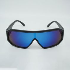 Style: S2958 Shape: Shield Protection: UV400 Lens Material: Plastic Eye/Bridge/Temple: 65/20/120 (mm) Memphis Futuristic Shield Sunglasses - S2958 Actual colors may vary. This is due to the fact that every computer monitor has a different capability to display colors and that everyone sees these colors differently. We try to edit our photos to show the samples as life-like as possible, but please understand the actual color may vary slightly from your monitor. We cannot guarantee that the color Futuristic Shield, Edgy Sunglasses, Oversized Round Sunglasses, Shady Lady, Blue Lens, Ladies Gents, Shield Design, Shield Sunglasses, Blue Lenses