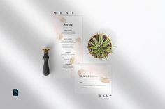 a menu with a succulent plant on it