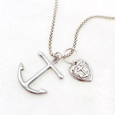 Anchors Aweigh with this sterling silver nautical necklace.  The anchor, marked "925", measures 7/8" L with ring, and 3/4" W, while the heart measures 3/4" L with ring.  The charms have been paired with an 17" popcorn chain marked "925 Italy.  Made from carefully selected vintage sterling silver components.  Total weight is 5.6 grams. The perfect gift for avid sailor or yacht club fixture. Classic Silver Anchor Jewelry, Nickel-free Anchor Shaped Sterling Silver Jewelry, Nickel-free Sterling Silver Anchor Jewelry, Everyday Silver Anchor Jewelry, Everyday Silver Jewelry With Anchor Shape, Nautical Necklace, Anchors Aweigh, Vintage Sterling Silver Charms, Vintage Charm Bracelet