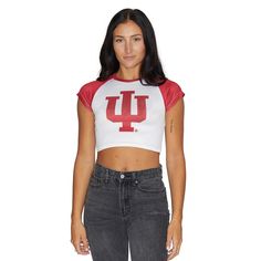 This super cropped and fitted Indiana Hoosiers tee is perfect for college game day paired! Its stretchy fabric makes it the perfect option for all body types. Stretchy and soft, you'll want to rock this top every day! Runs slightly small - order a size up if in between sizes. 95% Polyester, 5% Spandex. Cropped Fit. Sublimated Design. Machine wash on cold. Officially Licensed by Lo + Jo Bands. Casual Fitted T-shirt For Game Day, Fitted Short Sleeve Sporty Muscle Tee, Sporty Fitted Short Sleeve Muscle Tee, Sporty Crop Top For College In Spring, Stretch Summer Tops For College, Fitted Short Sleeve T-shirt For Cheerleading, Collegiate Style Fitted Tops For Spring, Spring Sports Cropped T-shirt, Casual Fitted Cropped T-shirt For Sports