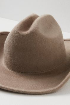 So chic western-inspired hat featured in a classic cowboy shaped silhouette with a cattleman crease crown, upturned brim, and interior ribbon adjuster for a so-perfect-fit. * Interior sweatband * Adjustable fit * Structured style | Cash Cowboy Hat by Wyeth at Free People in Tan Rigid Hat With Curved Brim For Western-themed Events, Rigid Curved Brim Hat For Western-themed Events, Rigid Fedora Hats For Rodeo, Rigid Fedora For Western-themed Events, Western Riding Hat With Curved Brim, Rigid Short Brim Fedora For Western-themed Events, Short Brim Rigid Fedora For Western-themed Events, Country Style Curved Brim Felt Hat For Riding, Rigid Felt Hat With Short Brim For Western-themed Events