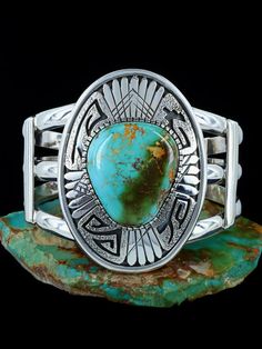 Native American Jewelry Sterling Silver Royston Turquoise Bracelet - PuebloDirect.com Artisan Turquoise Engraved Bracelet, Artisan Turquoise Engraved Bracelets, Western Turquoise Bracelet With Patina, Collectible Bohemian Turquoise Bracelets, Collectible Bohemian Turquoise Bracelet, Bohemian Turquoise Collectible Bracelets, Bohemian Engraved Turquoise Sterling Silver Bracelet, Bohemian Turquoise Engraved Sterling Silver Bracelet, Bohemian Engraved Turquoise Bracelets