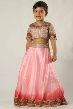 Pink blouse with zari embroidered motifs and mirror work. Paired with shaded lehenga and net dupatta.
Components: 3
Fabric: Lehenga and blouse: Organza;
Dupatta: Net
Neckline: Round
Sleeve Length: Half
Color: Red, pink
Embroidery
Scalloped lehenga and sleeve hems
Dupatta with mirror and scalloped hem
Closure:
Blouse: Conealed back placket
Lehenga: Side hook - Aza Fashions Red Embroidered Party Wear Traditional Dress, Red Embroidered Traditional Party Wear, Traditional Embellished Organza Sets, Embroidered Red Traditional Party Wear, Red Embroidered Choli For Party, Embroidered Red Choli For Party, Red Embellished Organza Sets, Party Wear Red Choli With Mirror Work, Embellished Anarkali Art Silk Sets