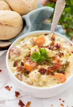 a bowl of soup with meat and vegetables