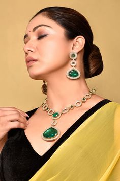 Gold tone necklace featuring green stone studded drops highlighted by clear stone embellished link patterns. Comes with matching drop earrings. - Aza Fashions Jewellery Sets, Silver Jewelry Fashion, Stone Studs, Clear Stone, Fashion App, Gold Tone Necklace, Green Stone, Aza Fashion, Necklace Set