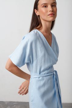 "SUMMER is a short sleeve true wrap closure linen wrap dress. DETAILS - True wrap closure - Dolman style sleeves - Knee length - 100% lightweight European linen fabric - Cut and sewn to order just for you in our studio COLOR - Baby Blue, you can also choose other colors above - Fabric samples are available here https://www.etsy.com/listing/586569696/linen-fabric-samples SIZING & FIT - Relaxed fit - True to size - Model is 5'9.5\" / 177cm and wearing a size XS CARE FOR LINEN - Machine wash up to 30ºC/86ºF gentle cycle - Lay flat to dry or tumble dry low - Warm iron if needed - Do not bleach SIZE GUIDE Size conversion guide Size XS (US 0-2, IT 36-38, UK 4-6, Japan 3-5, France 32-34) Size S (US 4-6, IT 40-42, UK 8-10, Japan 7-9, France 36-38) Size M (US 8-10, IT 44-46, UK 12-14, Japan 11-13, Summer Wrap Dress, Kimono Wrap Dress, Linen Wrap Dress, Easy Wrap, Sparkly Accessories, Linen Kimono, Studio Color, Kimono Wrap, Summer Linen Dresses