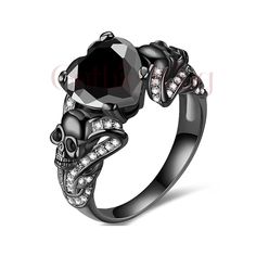 GOTHICKING OFFERS YOU VERY UNIQUE & ANTIQUE GOTHIC SKULL JEWELLERY WITH MULTI-COLOR METAL, LIKE YELLOW, ROSE, AND WHITE GOLD FINISH. WE OFFER CUSTOM JEWELLERY LIKE, METAL CHANGE, ENGRAVING AND GIFT CARD ETC. PRODUCT DESCRIPTION: Metal : Sterling Silver Metal Purity : 925 Metal Finish: Black Rhodium Finish Main Stone Color :  Black Main Stone Shape : Round Total Carat Weight : 2.50 Ct Main Stone : Lab Sapphire Cut Grade : Excellent Available Metal: White/Yellow/Rose Gold Finish Gothic rings are o Skull Wedding, Custom Jewellery, Gothic Skull, Gothic Rings, Wedding Engagement Ring, Black Sapphire, Unique Antiques, Black Rhodium, Yellow Rose