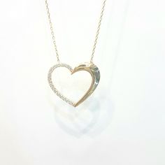 - Forever Love Heart Pendant Necklace is made with high quality 14K real solid gold. - High polish finish and half of the heart necklace for women decoreted with white diamond cut zirconia stones . - This cute, charm, dainty, delicate, elegant and trendy women jewelry Heart pendant necklace has been artfully designed for timeless yet modern millennial fashion. - You receive the necklace in a beautiful and free gift box - Free shipping (Arrive within 4 business days to the USA and Canada ( 1 day Fine Jewelry White Heart Charm Necklace, White Fine Jewelry Heart Necklace With Charm, White Double Heart Diamond Accent Necklace, White Double Heart Diamond Necklace, White Diamond Double Heart Necklace, White Heart Charm Necklace In Fine Jewelry Style, White Diamond Accented Necklaces For Anniversary Gift, White Necklaces With Diamond Accents For Anniversary, White Diamond Cut Necklace For Anniversary Gift