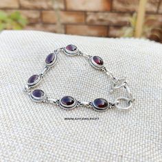 Welcome to our shop : -  Moonlightjewellerygift Garnet Bracelet, 925 Sterling silver Bracelet, Gemstone Bracelet, Dainty wristband, Oval Shape Bracelet, Beautiful Bracelet, Dainty Bracelet, Meditation Bracelet, Jewellery Bracelet, Gift For Her,  title-Garnet Bracelet 925 Sterling Silver Bracelet, Birthstone Jewelry, Charm Bracelet, Handmade Bracelet, Gift For Her, Anniversary Gift Jewelry, Garnet Garnets can come in virtually any color, but the most well-known are red. Before the development of modern gemology, many people treated all transparent red gemstones as the same type of stone. Therefore, you'll find many similarities between the folklore of garnets and rubies. Garnets with gorgeous, deep shades of red are said to energize wearers, which could help them deal with health issues. We Sterling Silver Gemstone Bracelet Gift, Silver Dainty Gemstone Bracelets, Sterling Silver Oval Chain Bracelet Gift, Silver Dainty Gemstone Bracelet, Silver Spiritual Bracelets With Gemstones, Dainty Silver Bracelet With Gemstone, Spiritual Silver Bracelet With Gemstone, Dainty Silver Gemstone Bracelet, Silver Gemstone Bracelets For Gifts