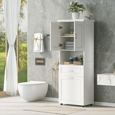 a bathroom with a toilet, sink and cabinet in it's corner next to a window