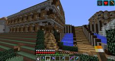 an image of a minecraft house with trees and bushes