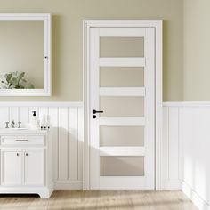 an empty bathroom with white walls and wood flooring, including a double door leading to the toilet