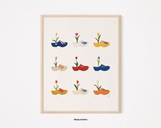 an art print with shoes and flowers on the bottom, in various colors that are red, yellow, blue, green