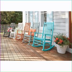 Indulge in the time-honored tradition of leisurely rocking away the hours on your porch or patio. Solid wood with slatted seat and back and a durable weather-resistant finish. Assembly required. 250-lb. capacity. 27\ Blue Rocking Chairs On Front Porch, Nantucket Rocking Chair Front Porches, Vintage Rocking Chair Front Porch, Wood Rocking Chair Front Porch, Colorful Rocking Chair Front Porches, Wooden Rocking Chair Front Porch, Double Rocking Chair Porches, Front Yard Rocking Chair, Porch Rocking Chair