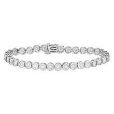 "Made from diamond accents set in miracle plates, this sterling silver bracelet lends a touch of sparkle to your attire. Made from diamond accents set in miracle plates, this sterling silver bracelet lends a touch of sparkle to your attire. Bracelet length: 7.25 in. Packaging: boxed Base material: sterling silver Plating: rhodium Finish: polished Nickel freeSTONE DETAILS Total weight: 1/2 ct. Setting: prong Color grade: H-I Clarity: I1-I2 Gemstones may have been treated to enhance their appearan White Gold Diamond Bracelet With Bezel Setting, White Gold Cubic Zirconia Diamond Bracelet With Bezel Setting, Round Diamond Bracelet With Channel Set, Formal Diamond White Channel Set Bracelet, Anniversary Bracelets With Bezel Setting In Diamond White, Luxury Silver Tennis Bracelet With Bezel Setting, Classic Silver Diamond Bracelet With Bezel Setting, Channel Set Diamond Bracelet For Anniversary, White Gold Wedding Bracelet Channel Set