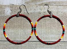 Southwestern Style Round Bead Earrings For Festivals, Southwestern Style Earrings With Round Beads For Festivals, Handmade Southwestern Red Jewelry, Artisan Adjustable Hand-strung Earrings, Adjustable Hand-strung Beaded Earrings, Southwestern Style Beaded Dangle Hoop Earrings, Southwestern Adjustable Dangling Bead Earrings, Southwestern Beaded Round Earrings, Southwestern Style Beaded Round Earrings