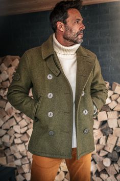 MODEL WEARS MEDIUM: Chest 38" // Waist 32" // Height 5ft 11" The Boardwalk Peacoat is an iconic piece in any &SONS wardrobe and a true Pioneer favourite. The classic silhouette is something that can’t be beaten and a new season brings a new distinctive version: The Boardwalk peacoat in Army Green. With the same much-loved details as the original, we took inspiration from the archives of style and created something special. A true labour of love for our Creative Director and Founder Phil James. F Rugged Man Style, Rugged Men Style, Leo Fashion, Boy Closet, Turtleneck Outfits, Men Pants Pattern, Wool Car Coat, Green Peacoat, Winter Travel Outfit