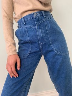 Vintage Wrangler jeans Love the big patch pocket details on the front and seam detail too. Good for a petite height (5ft 4" and under) Recommended size UK8. Waist 26". Inside leg 27". Bella is UK 8, she is 5ft 4.5" 100% cotton Colour : Mid blue denim wash Good vintage condition. Never worn, still has tags from the 90s!All pre-loved pieces have lived past lives, their imperfections are all part of their uniqueness and beautyMachine washable Mid-rise Cargo Jeans With Patch Pockets For Everyday, Everyday Mid-rise Cargo Jeans With Patch Pockets, Everyday High Waist Jeans With Side Pockets, Everyday Jeans With Side Pockets And Cropped Leg, High Rise Jeans With Side Pockets For Everyday, Denim Blue Flare Jeans With Patch Pockets For Fall, Fall Denim Blue Flare Jeans With Patch Pockets, Medium Wash Straight Leg Cropped Jeans With Pockets, Fall Medium Wash Flare Jeans With Patch Pockets