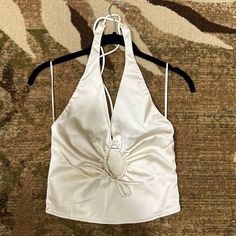 Work Once, Very Cute Top!! Received A Lot Of Compliments. No Stains, In Almost Brand New Condition!! Key Hole Area Adjusts In Size. Cropped Halter Top For Spring Evening, Halter Neck Tops For Spring Evenings, Spring Evening Halter Neck Top, Evening Halter Neck Top For Spring, White Summer Halter Top For Evening, White Halter Top For Summer Evening, White Halter Top For Summer Evening Events, Fitted Satin Halter Neck Top, Spring White Halter Top For Party