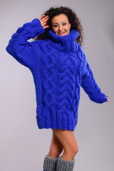 "Brand new chunky knit Sweater in Royal blue Color. Turtleneck collar. Super chunky and warm. This super big and trendy sweater is soft and warm. Easy to combine with jeans /skirts. Matching leg warmers available. Materials : Soft premium quality soft bulky wool. Color: Royal blue Measurements : Body length: 28 \" / 72 cm Chest width: 20,5 \" / 52 cm Sleeve measured from the neckline to the end of the cuff: 28 \" / 71 cm Neck unrolled - 16''/ 40 cm All the measurements are taken with the item fl Winter Chunky Knit Sweater, Casual Cowl Neck Winter Sweater, Oversized Blue Turtleneck Sweater, Blue Funnel Neck Sweater For Winter, Blue Funnel Neck Winter Sweater, Oversized Cable Knit Turtleneck, Chunky Knit Acrylic Sweater For Cold Weather, Oversized Cable Knit High Neck Turtleneck, Winter Long Sleeve Chunky Knit Turtleneck