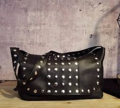 Small leather studded handbag with adjustable strap for women gothic style. Small studded bag is very practical and comfortable and good capacity as it has a wide bottom, has an inside pocket and a strip with a small carabiner for keys or a small coin holder, closes with magnet. It has an adjustable studded strap on both sides, you can use it for other bags because you will fall in love with it. This small but great bag can be carried cross body or as a shoulder bag. The strap that is also made Shoulder Holster Bag, Bags Inspiration, Shoulder Holster, Holster Bag, Studded Handbag, Small Leather Bag, Studded Bag, Bag Dark, Coin Holder