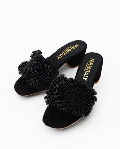 With the Antonella Black Pearl Mules, you can bring your style for the evening to the next level. These statement mules will add refinement and glamour to your wardrobe thanks to the elaborate detailing on the leather and the bright black pearls that adorn the uppers. The Antonella is an outstanding accent to any outfit, and they will take you from night to day in an effortless and luxurious manner. Details: Hand embroidered black pearls accessory Natural calfskin lining Slip-on style Heel heigh Pearl Mules, Italy Gift, Evening Style, Leather Stitching, Pearl Accessories, Black Pearls, Comfortable Sneakers, Black Pearl, Espadrilles Wedges