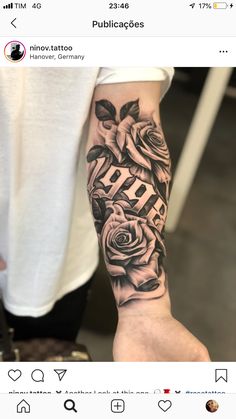 a person with a rose tattoo on their arm and the words faith written in black ink