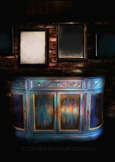 an ornately decorated buffet table in front of two framed pictures on a brick wall