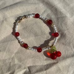 Handmade in the UK🇬🇧 Just over 18cm - please message for custom sizing (prices may vary slightly). Handmade using beading wire for durability. - not suitable for young children due to choking hazard - please refrain from getting the jewellery in contact with water Instagram - @wearecoastalcharms🐚✨ Thank you for supporting my small business Red Clay Bracelet Ideas, Red Bracelet Ideas, 80s Bracelets, Small Bead Bracelets Ideas, Small Bead Bracelet, Red Beaded Bracelet, Gelang Manik-manik, Bracelet Inspo, Bracelets Patterns