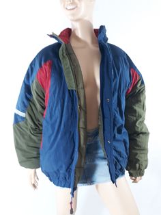 "90's Child's Ski Jacket Colorblock Blue Khaki Red Sportswear Outerwear Super Warm Excellent Condition Vintage by PACIFIC TRAIL Kids Size XL Super warm! Quilted , puffy and insulated. Snaps at wrists and deep zippered side pockets. Front zipper with snaps, elastic waist, silver reflective strips on colorblock geo design blue red khaki green. Super high quality. Excellent condition. Easy to wear casual chic vintage for the disco sporting life. MEASUREMENTS: Length - 28\" Chest- (underarms to unde Winter Color Block Outerwear For Outdoor Activities, 90s Patchwork Blue Outerwear, 90s Style Blue Patchwork Outerwear, 90s Blue Patchwork Outerwear, Sporty Patchwork Track Jacket For Winter, 90s Patchwork Winter Outerwear, 90s Style Winter Patchwork Outerwear, Vintage Color Block Windbreaker For Winter, Blue Color Block Track Jacket For Winter